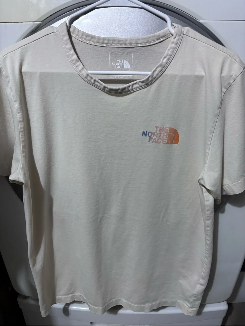 The North Face Men’s Short-Sleeve Logo Tee — Light Taupe with Multicolor Logo